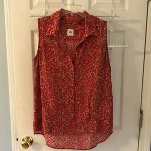 CAbi vintage “Heartbreaker” bright animal print hi/low button front collar tank